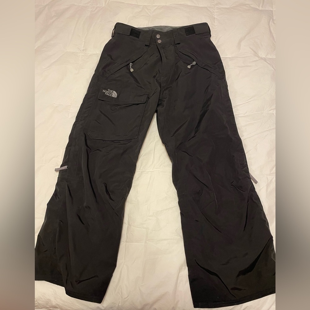 The North Face black winter snow pants. Men size small. Barely worn.